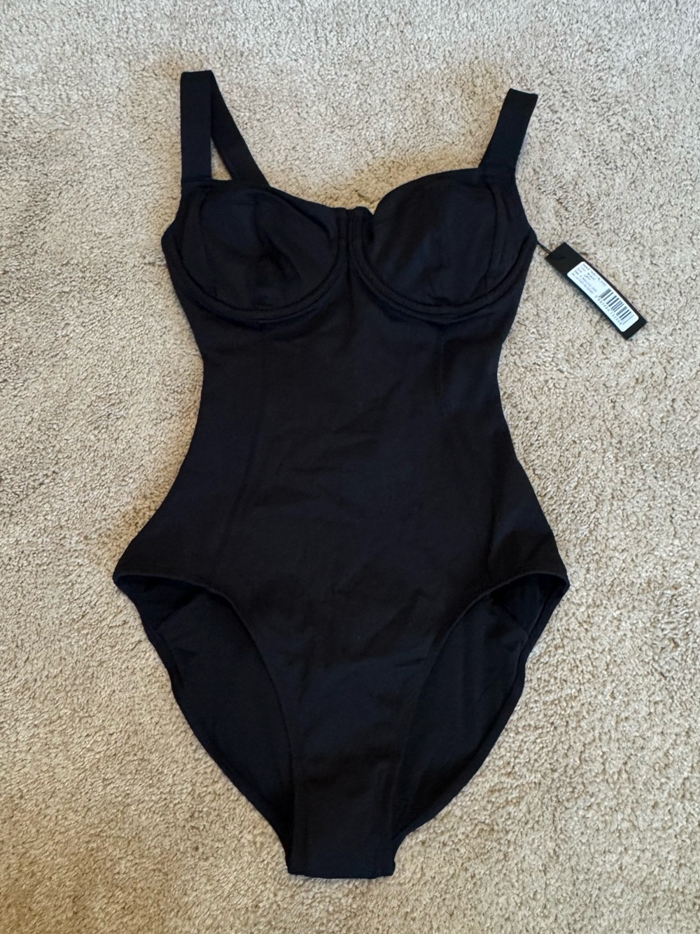 Sleek Black One-Piece Swimsuit with Molded Cups